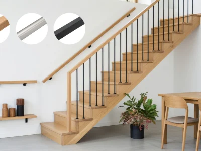 Escalier en bois avec une main courante escalier moderne et des balustres noirs dans un intérieur contemporain