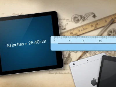 Une tablette tactile illustrant la conversion de 10 pouce en cm avec une règle graduée en arrière-plan