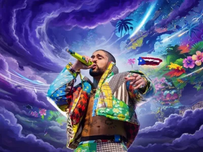Bad Bunny chante sur scène pendant un concert Bad Bunny dans une ambiance tropicale.