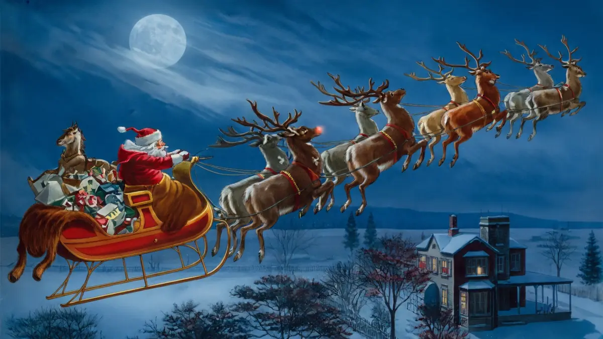 Le nom des rennes du Père Noël est représenté par le traîneau volant au-dessus d'une maison enneigée