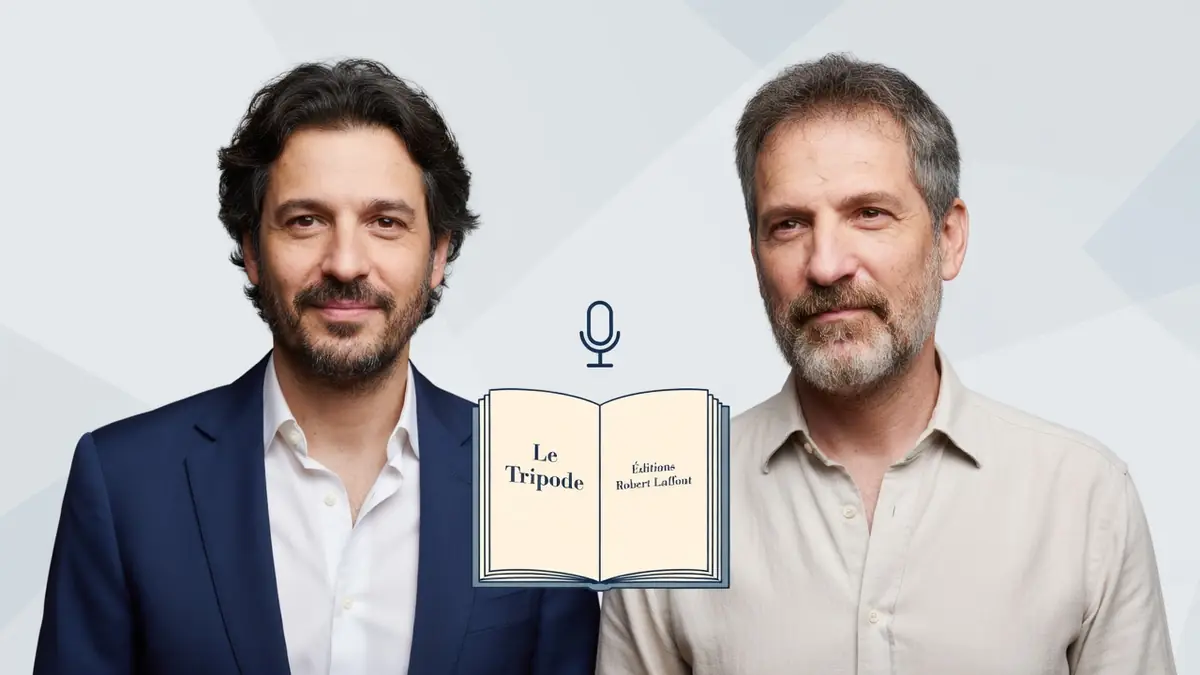 Frédéric Martin pose avec un autre homme sur ce portrait professionnel.