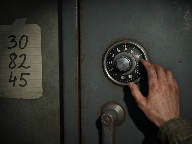 Une main actionne le cadran d'un coffre dans code coffre The Last of Us 2