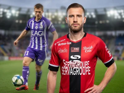 Franck Tabanou se tient sur un terrain de football avec un joueur en arrière-plan