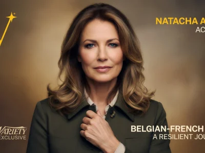 Portrait élégant et sérieux de l'actrice Natacha Amal posant devant un fond neutre