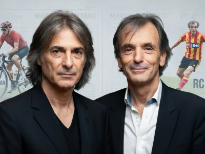 Philippe Brunel et un autre homme en costume sont photographiés ensemble