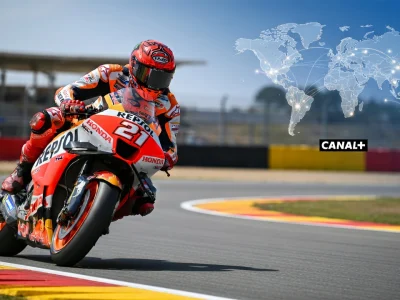 Un pilote moto penché dans un virage sur le circuit pour horaire GP Moto