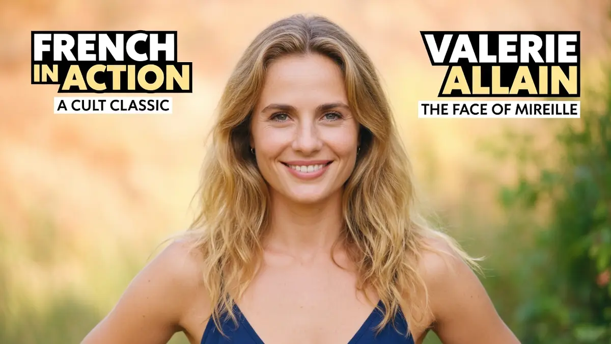 Valérie Allain sourit à l'appareil photo vêtue d'une robe bleue